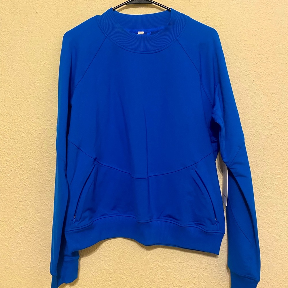 NWT blue Lululemon sweatshirt. Size 8
